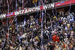 Streamers explode over fans as the Washington Wizards defeat the Los Angeles Lakers in the fourth quarter of an NBA basketball game at the Verizon Center in Washington, Wednesday, March 7, 2012. The Wizards won 106-101. (AP Photo/Jacquelyn Martin)