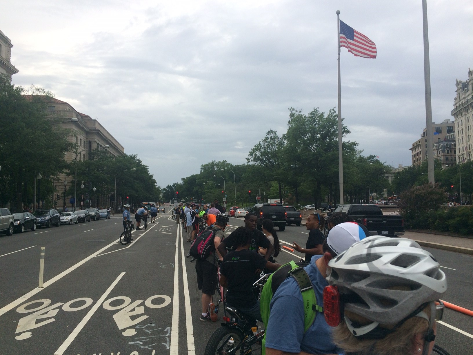 The riders want to see protective barriers known as "park-its" placed along the 1300 and 1400 blocks of Pennsylvania Avenue. (WTOP/Mike Murillo)