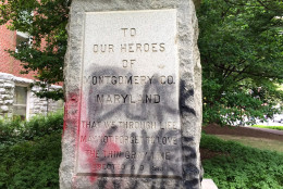 The words "Black Lives Matter" are scrawled across the pedestal of a Confederate statue in Rockville. The vandalism was discovered Monday morning to the sculpture that was already targeted for removal from county property. (WTOP/Kate Ryan)