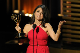 Julia Louis-Dreyfus accepts the award for outstanding lead actress in a comedy series for her work on Veep at the 66th Annual Primetime Emmy Awards at the Nokia Theatre L.A. Live on Monday, Aug. 25, 2014, in Los Angeles. (Photo by Chris Pizzello/Invision/AP)