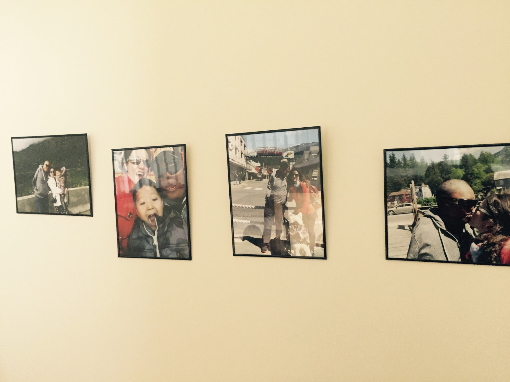 Pictures of the Porta family hanging in the new house. (WTOP/Max Smith)