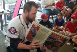 Nationals relief pitcher Drew Storen reads to kids Saturday, Aug. 29, 2015 at Tenley-Friendship Library in Northwest D.C. (WTOP/Kathy Stewart)