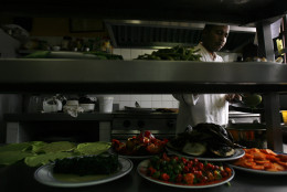 ** FOR STORY SLUGGED CUBA PALADARES **  A Cuban chef cooks at La Guarida, Havana's best known paladar, or private restaurant, in Havana, Monday, March 10, 2008.  (AP Photo/Javier Galeano)