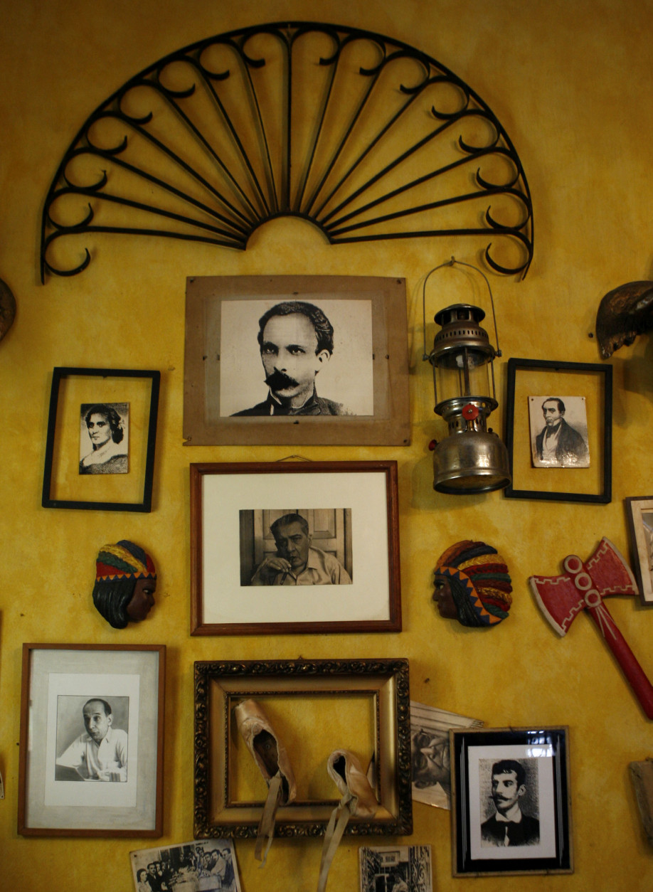 A wall at La Guarida, Havana's best known paladar, or private restaurant, is decorated with Cuban memorabilia in Havana, Monday, March 10, 2008. (AP Photo/Javier Galeano)
