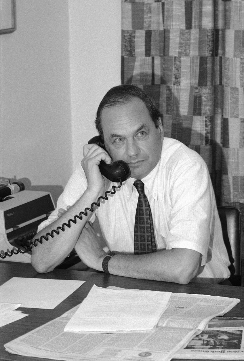 Five years ago on Aug. 13, veteran NBC newsman Edwin Newman died in Oxford, England, at age 91. He is shown here at his office at NBC in 1971. (AP Photo/John Rooney)