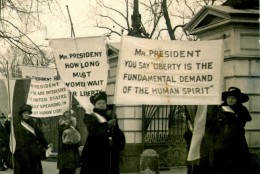 This is a circa 1918 photo of women demonstrating at the White House demanding voting rights. T(AP Photo)