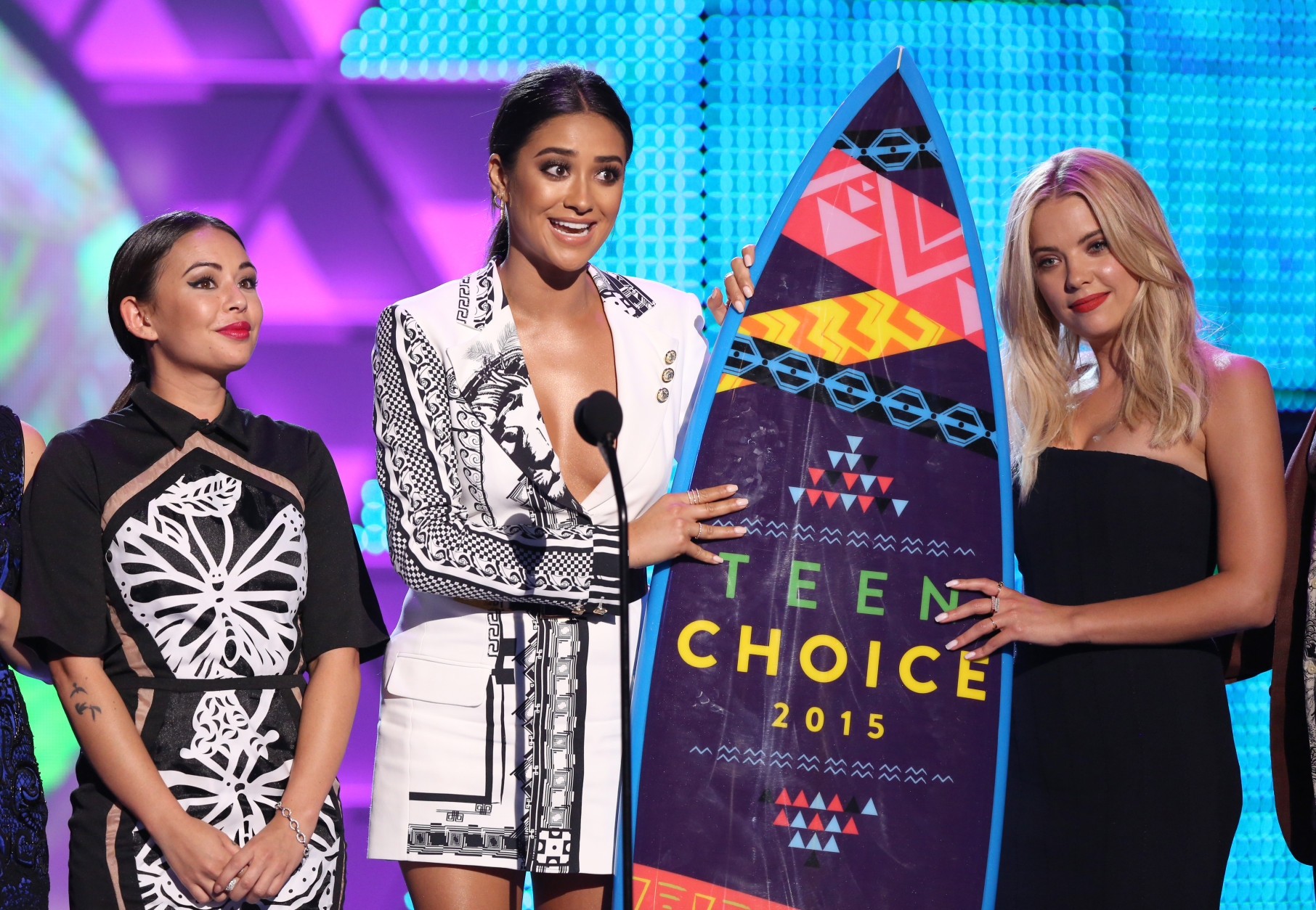 Janel Parrish, from left, Shay Mitchell and Ashley Benson accept the award for choice TV: drama show for "Pretty Little Liars" at the Teen Choice Awards at the Galen Center on Sunday, Aug. 16, 2015, in Los Angeles. (Photo by Matt Sayles/Invision/AP)