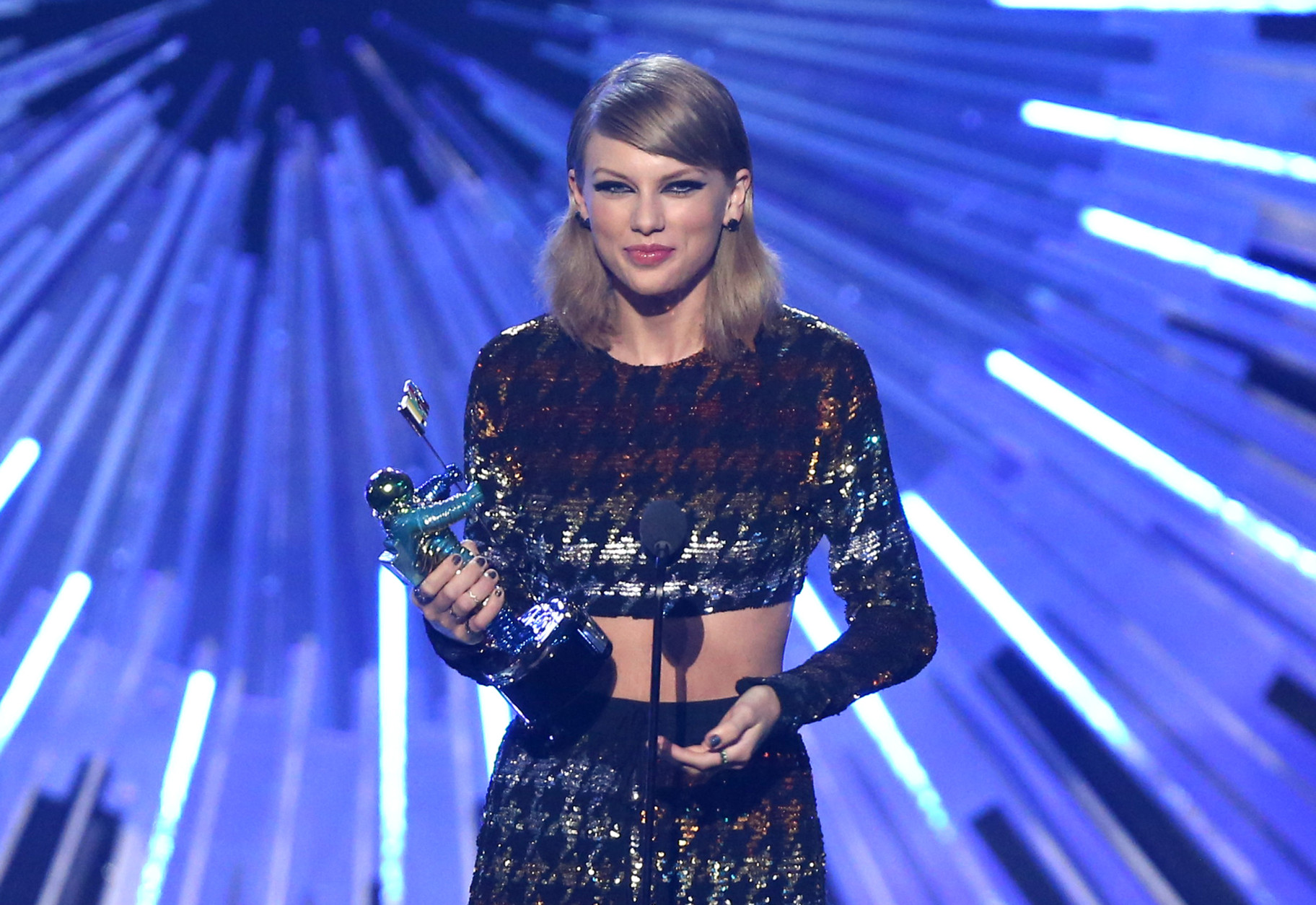 Taylor Swift accepts the award for female video of the year for Blank Space at the MTV Video Music Awards at the Microsoft Theater on Sunday, Aug. 30, 2015, in Los Angeles. (Photo by Matt Sayles/Invision/AP)