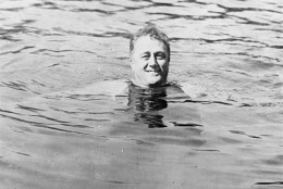 On this date in 1921, Franklin D. Roosevelt was stricken with polio at his summer home on the Canadian island of Campobello. Here, Roosevelt swims in the pool at Warm Springs, Ga. where he went to regain his health following a polio attack in 1924. (AP Photo)