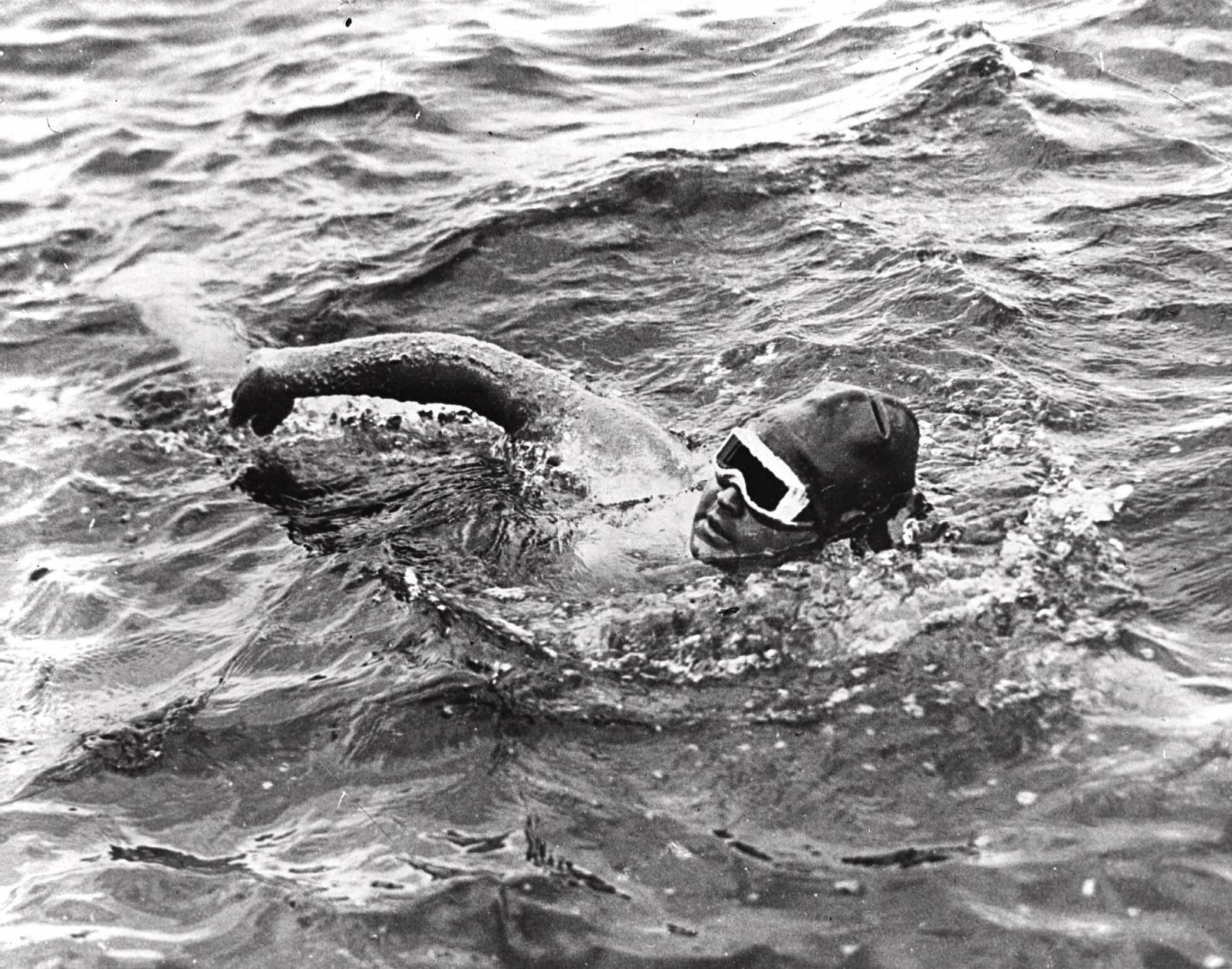 Nineteen-year-old Gertrude Ederle of New York City becomes the first woman to swim the English Channel on Aug. 6, 1926, as she crosses the waterway in 14 hours and 31 minutes. (AP Photo)