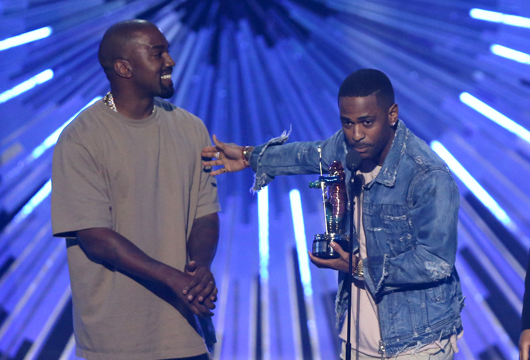 Kanye West, left, and Big Sean accept the award for video with a social message for One Man Can Change the World at the MTV Video Music Awards at the Microsoft Theater on Sunday, Aug. 30, 2015, in Los Angeles. (Photo by Matt Sayles/Invision/AP)