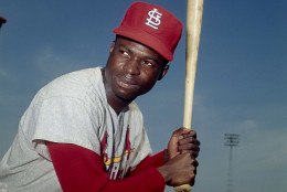 On this date in 1979, Lou Brock of the St. Louis Cardinals became the 14th player in major league baseball history to reach the 3,000th career hit plateau as his team defeated the Chicago Cubs, 3-2. He is shown here in 1965. (AP Photo) 