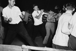 Fighting rages at picnic grove in Peekskill, New York, the night of Aug. 27,1949 as veterans break up scheduled concert by black singer Paul Robeson.  (AP Photo)