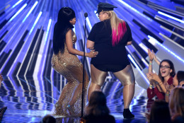 Presenter Rebel Wilson, right, dances with Nicki Minaj as Minaj arrives on stage to accept the award for hip-hop video of the year at the MTV Video Music Awards at the Microsoft Theater on Sunday, Aug. 30, 2015, in Los Angeles. (Photo by Matt Sayles/Invision/AP)