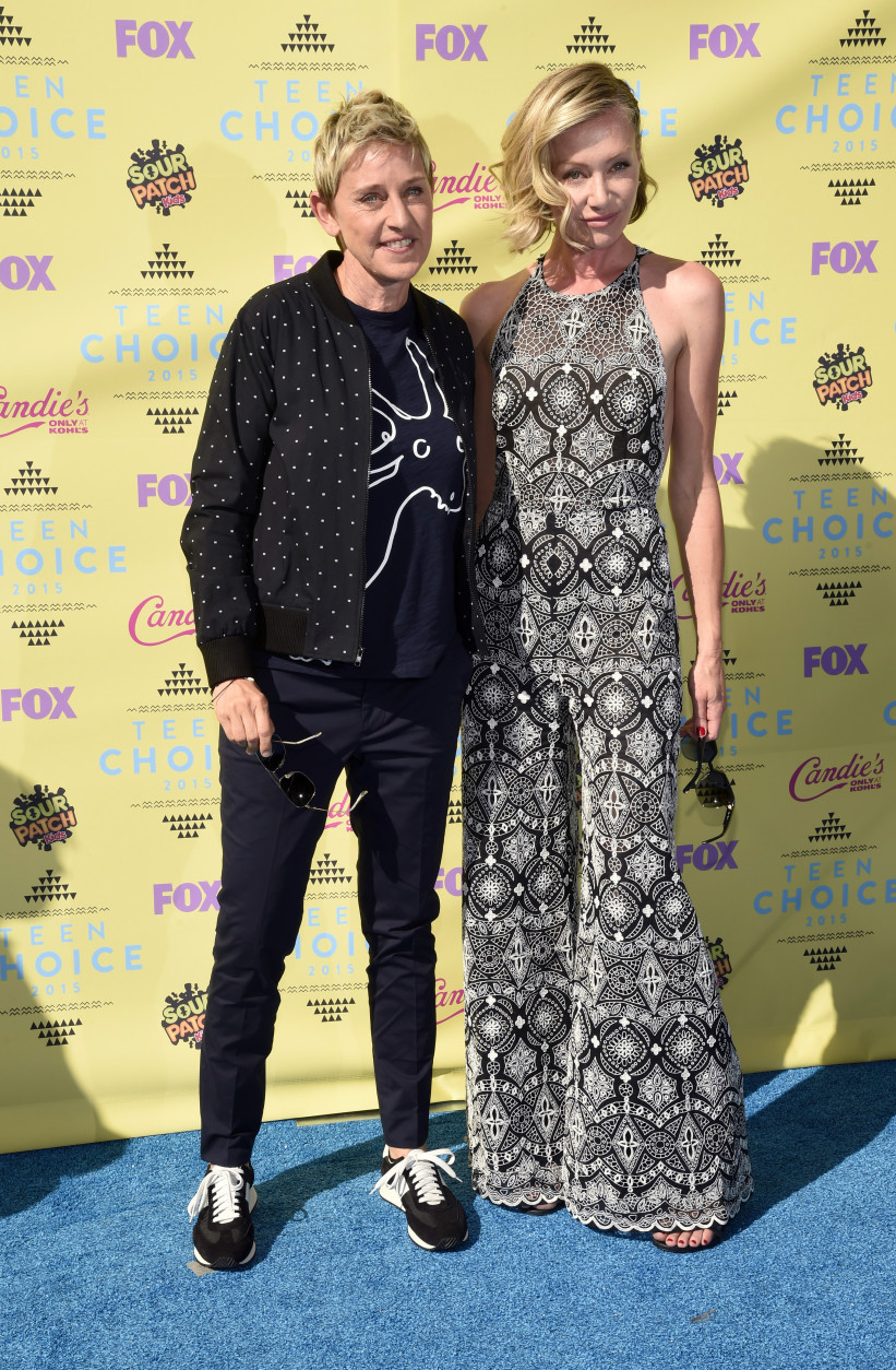 Ellen DeGeneres, left, and Portia de Rossi arrive at the Teen Choice Awards at the Galen Center on Sunday, Aug. 16, 2015, in Los Angeles. (Photo by Chris Pizzello/Invision/AP)