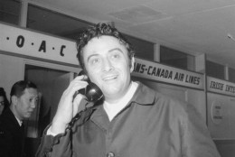 On this date in 1966, comedian Lenny Bruce, 40, was found dead in his Los Angeles home. He is seen here at New York's Idlewild Airport, April 8, 1963.  (AP Photo)