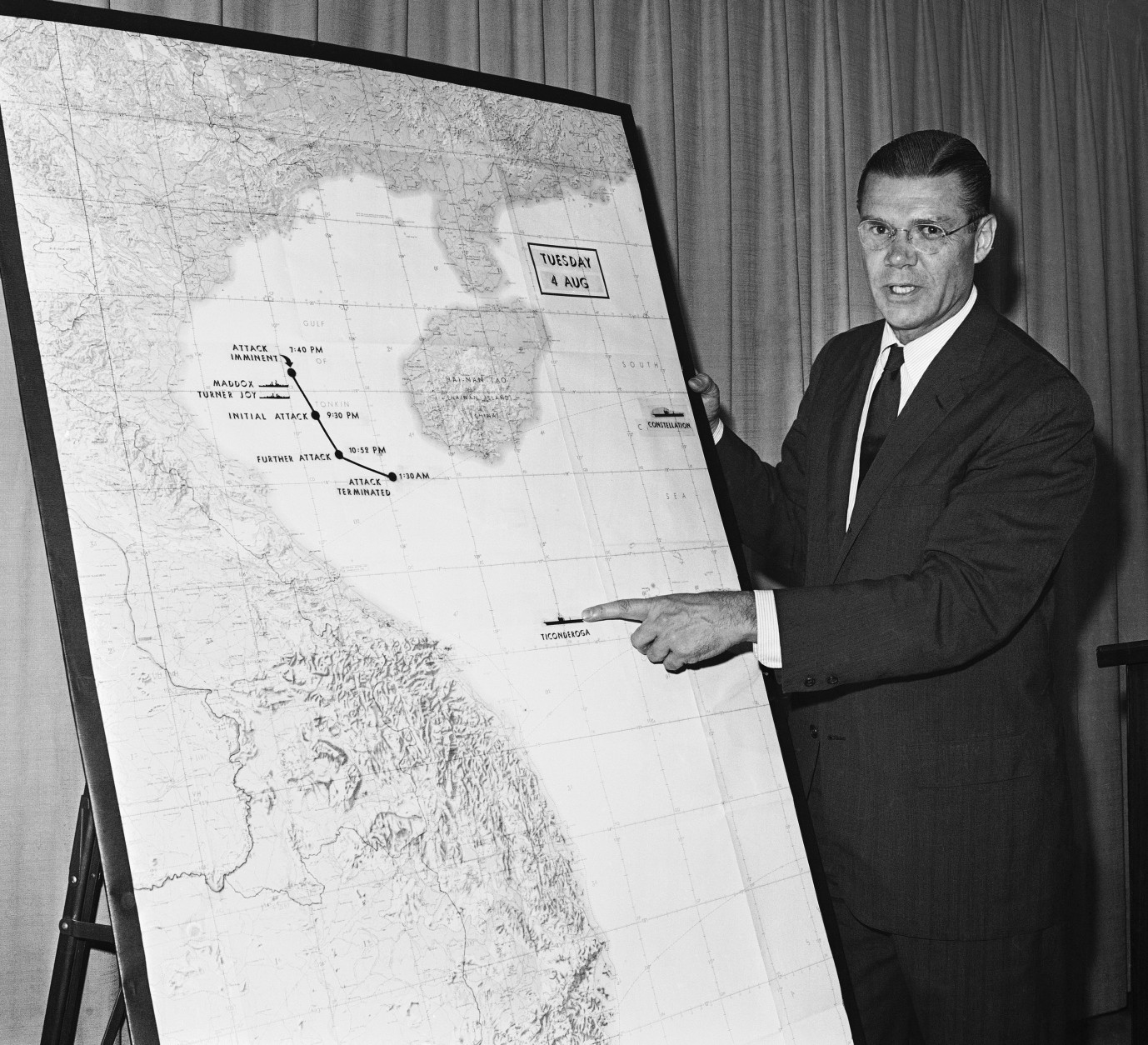 On this date in 1964, Congress passed the Gulf of Tonkin resolution, giving President Lyndon B. Johnson broad powers in dealing with reported North Vietnamese attacks on U.S. forces. Here, Secretary of Defense Robert S. McNamara in a post-midnight press briefing, August 4, 1964 in the Pentagon points out action in Gulf of Tonkin. (AP Photo/Bob Schutz)