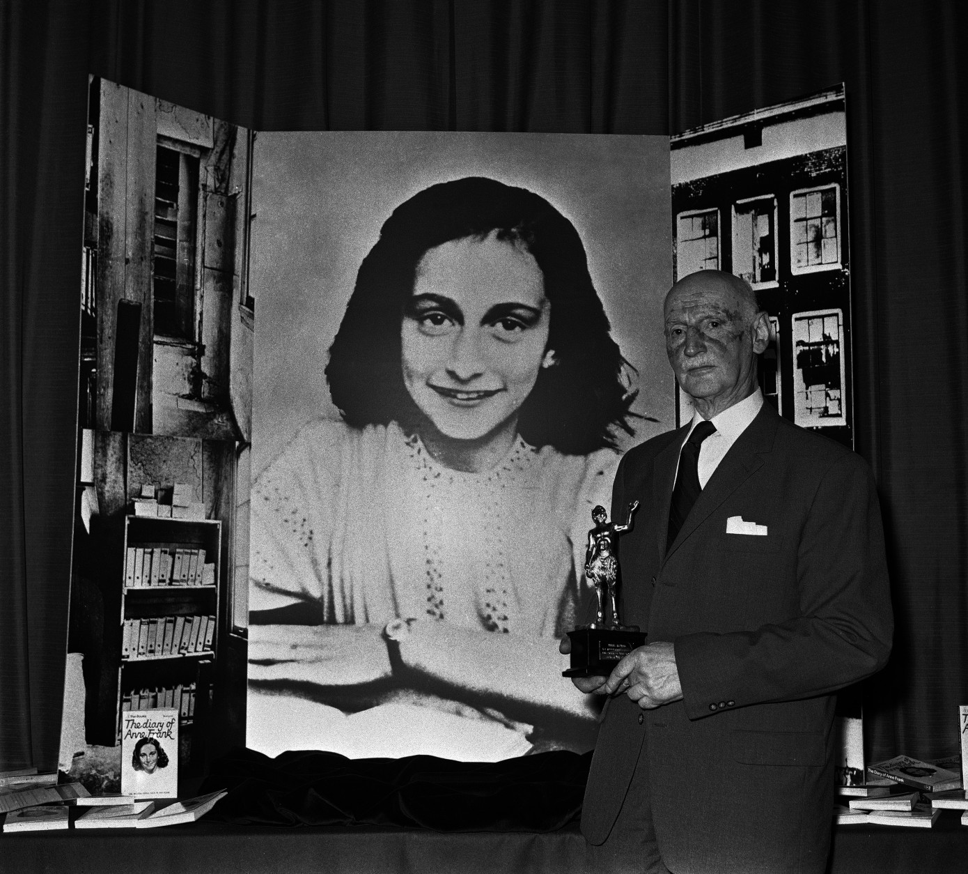 On this date in 1944, 15-year-old diarist Anne Frank was arrested with her sister, parents and four others by the Gestapo after hiding for two years inside a building in Amsterdam. Here, Dr. Otto Frank holds the Golden Pan award, given for the sale of one million copies of the famous paperback, "The Diary of Anne Frank." (AP Photo/Dave Caulkin)