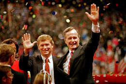 FILE - In this Aug. 18, 1988 file photo, Republican presidential candidate, Vice President George H.W. Bush,  right, and his running mate Sen. Dan Quayle, R-Ind., wave to the assembly of the Republican National Convention in New Orleans after their acceptance speeches for the presidential and vice-presidential nomination.  Long gone are the passionate debates. Long gone is the suspense about who will emerge as the party's presidential nominee. Political conventions now are carefully scripted pep rallies aimed at a national TV audience. Not since the 1970s, in fact, has the nation had a major-party national convention begin with the nominee in doubt. Americans already know how the story will end at this year's Republican and Democratic national gatherings. So have modern-day conventions become irrelevant?  (AP Photo/J. Scott Applewhite, File)