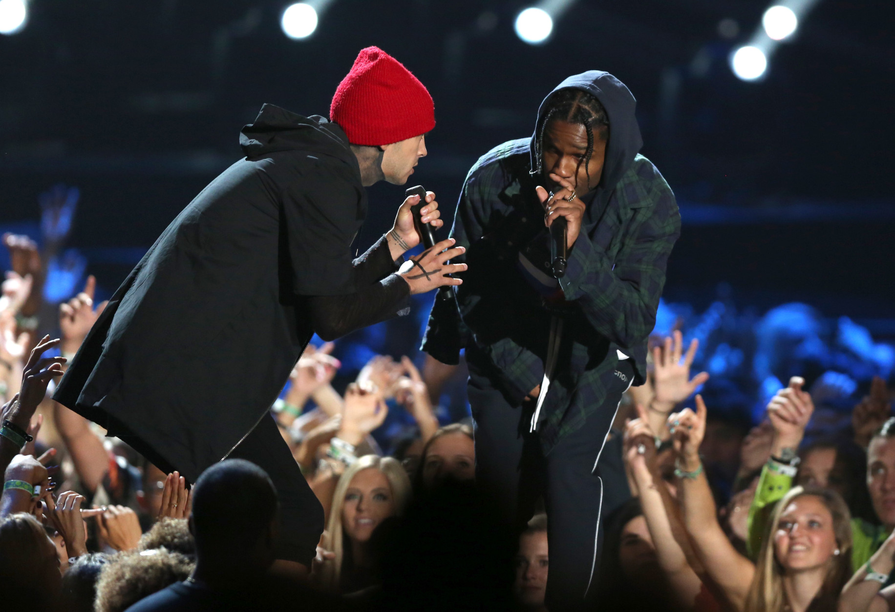 Tyler Joseph of 21 Pilots, left, and A$AP Rocky perform at the MTV Video Music Awards at the Microsoft Theater on Sunday, Aug. 30, 2015, in Los Angeles. (Photo by Matt Sayles/Invision/AP)