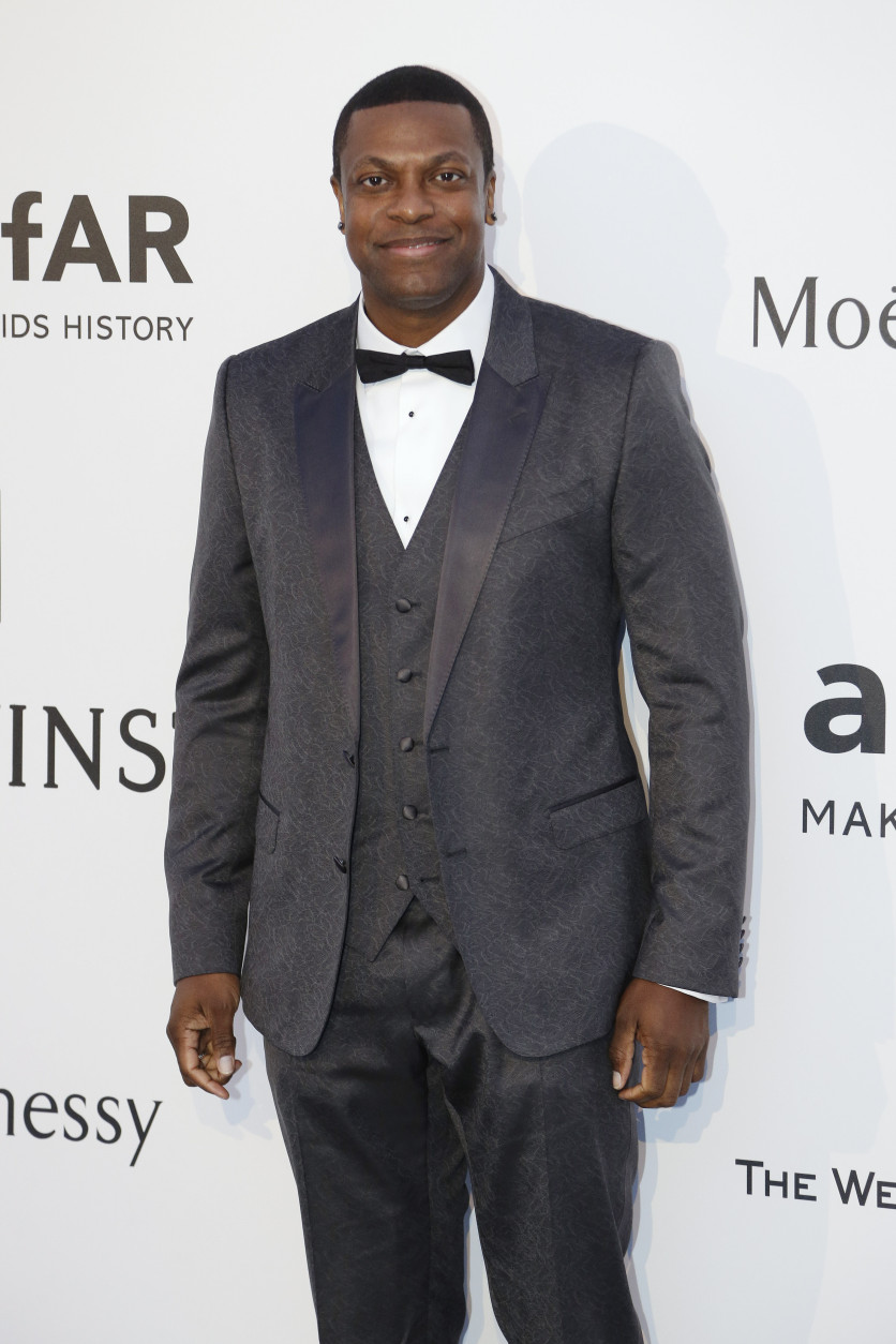 Actor Chris Tucker is 43 on Aug. 31. Here, Tucker poses for photographers upon arrival for the amfAR Cinema Against AIDS benefit at the Hotel du Cap-Eden-Roc, during the 68th Cannes international film festival, Cap d'Antibes, southern France, Thursday, May 21, 2015. (AP Photo/Thibault Camus)
