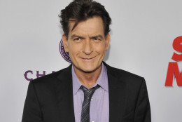 Actor Charlie Sheen is 50 on Sept. 3. In this April 11, 2013 file photo, Sheen, a cast member in "Scary Movie V," poses at the Los Angeles premiere of the film. (Photo by Chris Pizzello/Invision/AP, file)