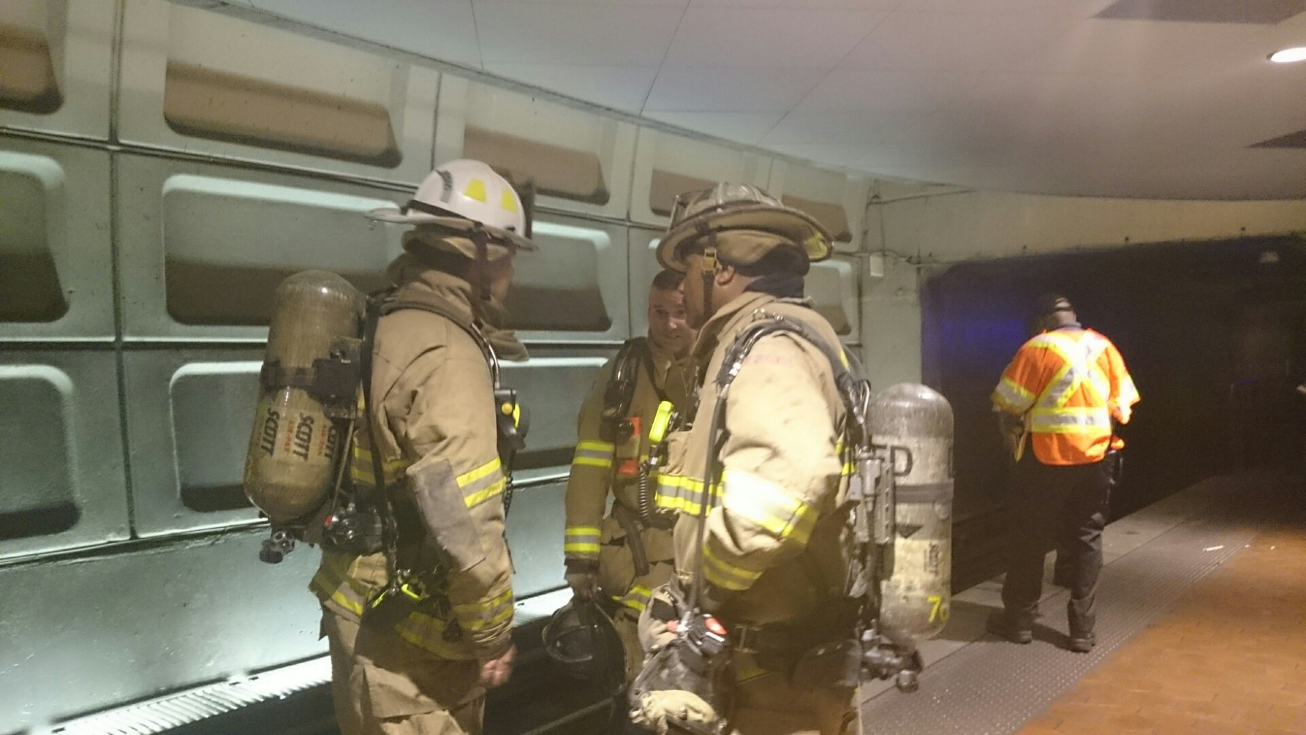 Emergency responders take part in smoke incident drill at Stadium-Armory station in Southeast DC Sunday morning. 