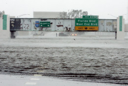 The Mound Underpass on Interstate-10 is flooded near downtown New Orleans on Monday, Aug. 29, 2005, as Hurricane Katrina dumped torrential rain and battered the city when it made landfall near Grand Isle.  (AP Photo/Bill Haber)
