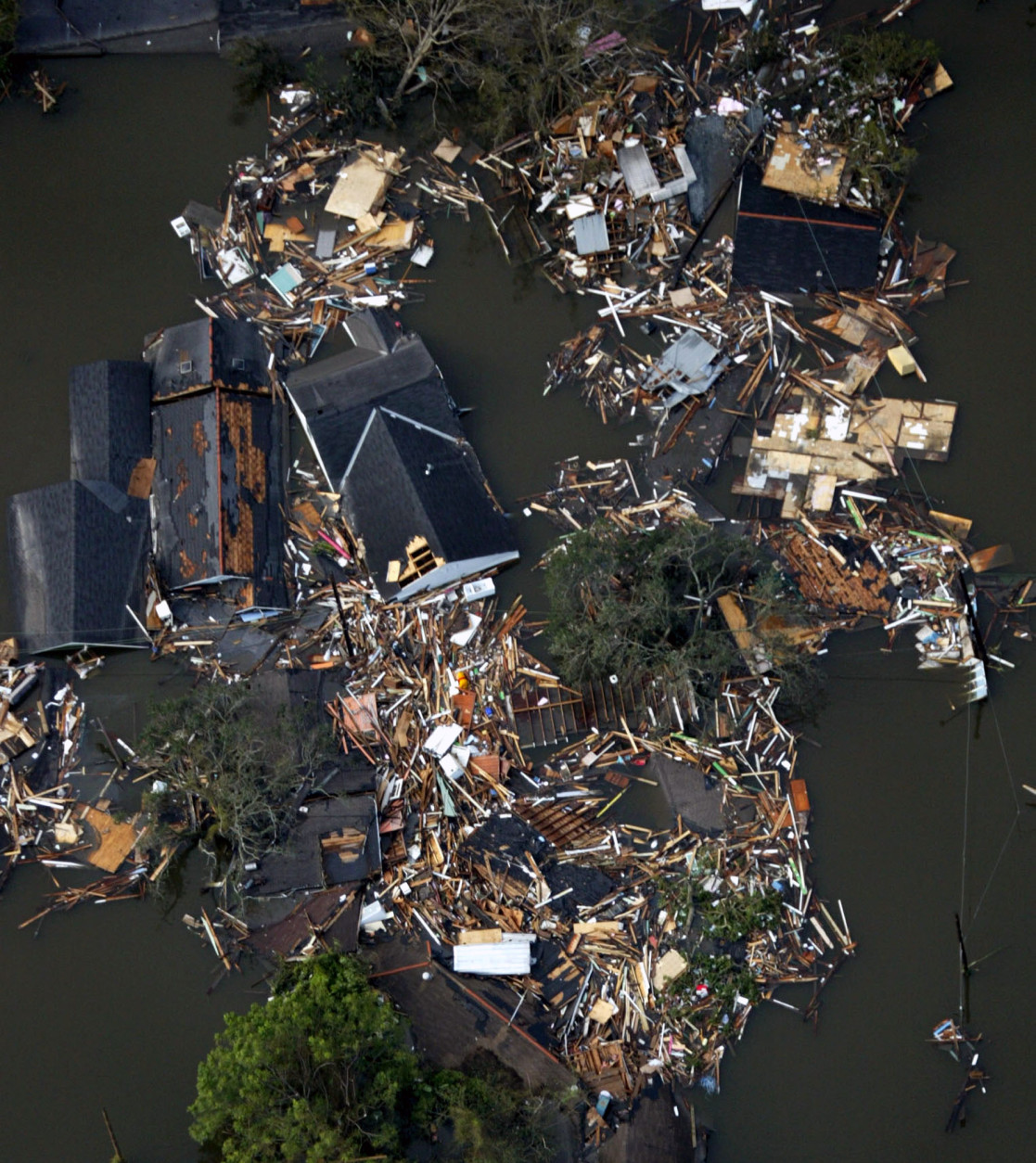 Homes destroyed by Hurricane Katrina are shown in this aerial view, Tuesday, Aug. 30, 2005, in New Orleans. (AP Photo/David J. Phillip)