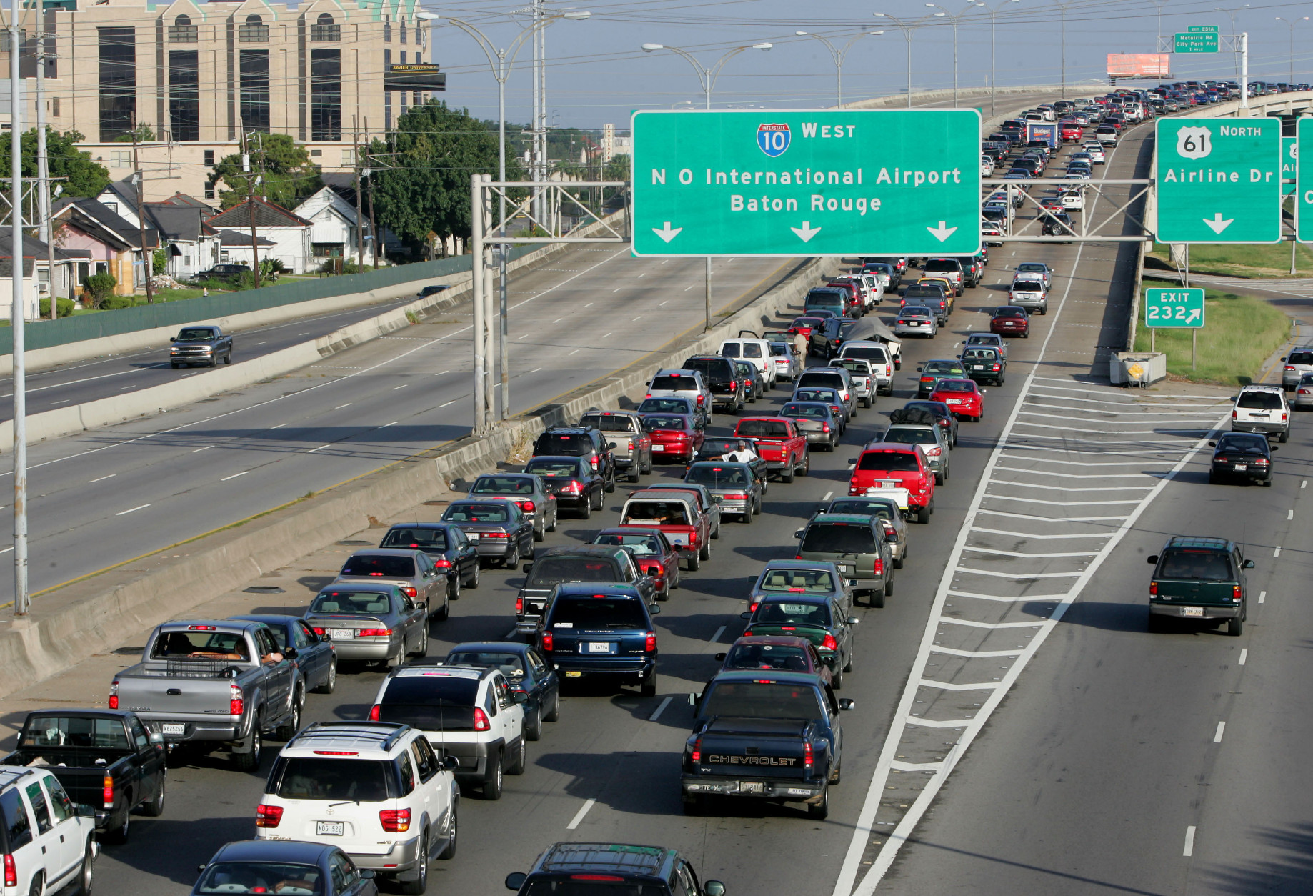 Interstate-10 westbound out of New Orleans continues to be jammed with traffic as residents evacuate ahead of Hurricane Katrina on Sunday, Aug. 28, 2005.  The Category 5 storm is expected to make landfall on Monday. (AP Photo/Dave Martin)