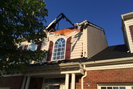 A Marriottsville house burned after it was struck by lightning in Tuesday morning's storms. (WTOP/Nick Iannelli)