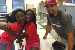 The day after some young players watched the Nationals get a win at Nats Park, some of the Big Leaguers dropped by their facility in Southeast. The pros watched and played along in the field. Anthony Rendon had some young players autograph his shirt. (WTOP/Andrew Mollenbeck)
