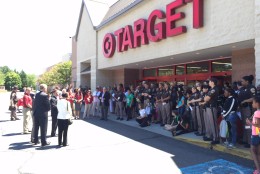 At the Burke, Virginia, Target, 40 children being treated to a shopping spree are from Katherine K. Hanley Family Shelter in Fairfax, Patrick Henry Family Shelter in Falls Church and Next Steps Family Shelter in Alexandria. (WTOP/Kristi King)