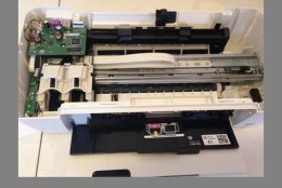 Sumathipala took apart a printer and reassembled it to hold a special cartridge. (Courtesy Adriel Sumathipala)