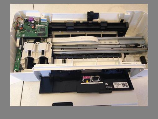 Sumathipala took apart a printer and reassembled it to hold a special cartridge. (Courtesy Adriel Sumathipala)