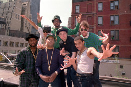 The street music groups Run-DMC and the Beastie Boys pose atop a restaurant in midtown Manhattan on Monday, May 11, 1987.  The two groups held a news conference to announce their 40-city "Together Forever" tour, which kicks off in Hawaii June 12.  Posing, in front from left, are, Jason "Jam Master Jay" Mizell, Jospeh "Rappers Run" Simmons, and Davy D; in back from left are, Mike D., Darryl "DMC" McDaniels, King Ad-Rock, and MCA.  (AP Photo/Marty Lederhandler)