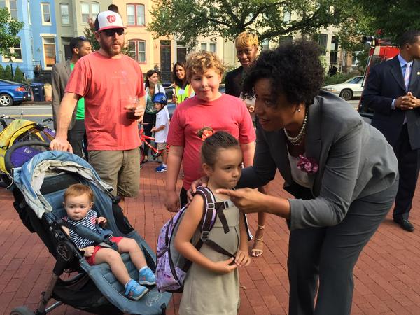 Mayor Muriel Bowser welcomes kids back to school for the 2015-2016 academic year with her "Slow Down" campaign. (Photo: WTOP/Kristi King)