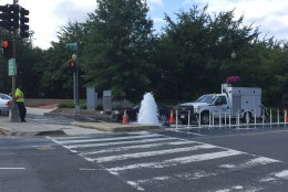A water main burst on inbound Canal Road in D.C. on Aug. 11, 2015. (WTOP/Megan O'Rourke)