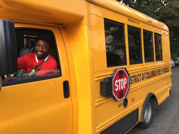 School bus driver Cory Upchurch welcomes his riders back to school. (Photo: WTOP/Kristi King)