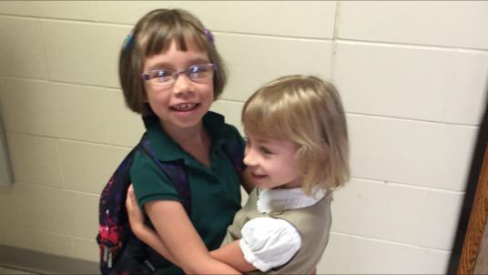 Marcella and Alia are excited to be reunited for the first day of first grade. (Photo: WTOP/Kristi King)