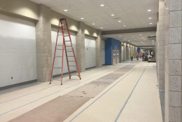 Main entrance hallway - the tile floor is done, just covered to protect it from any equipment going in and out. (WTOP/Max Smith)