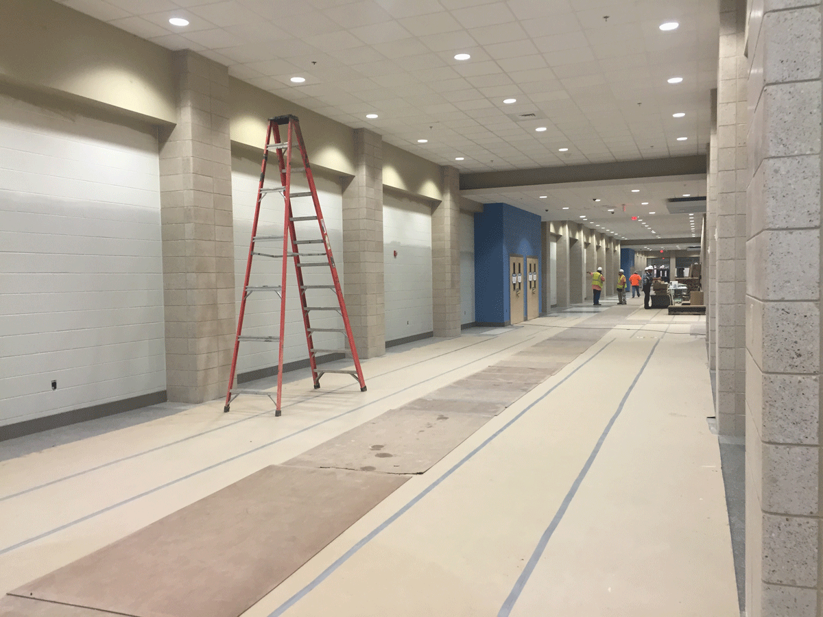 Main entrance hallway - the tile floor is done, just covered to protect it from any equipment going in and out. (WTOP/Max Smith)