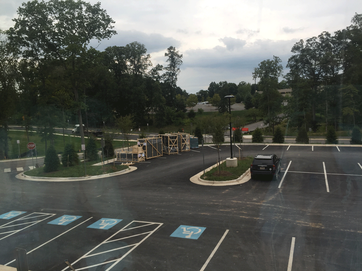 Staff parking lot with the National Conference Center in the background. (WTOP/Max Smith)