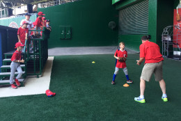 The young baseball players ran through drills and got one-on-one tips from the pros. (WTOP/Andrew Mollenbeck)
