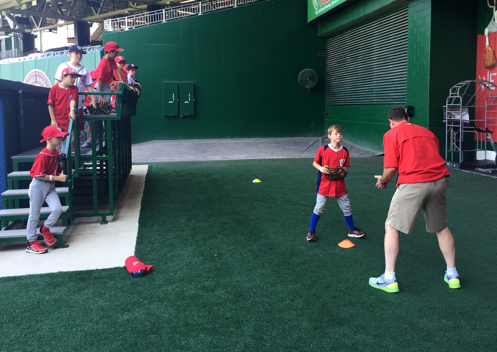 The young baseball players ran through drills and got one-on-one tips from the pros. (WTOP/Andrew Mollenbeck)