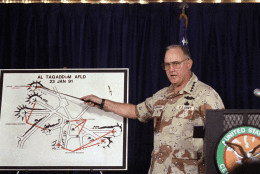 U.S. Army General H. Norman Schwarzkopf, commander of allied forces in Operation Desert Storm, points to a chart of Iraq?s Al Taqaddum Airfield damaged by allied bombing raids in Operation Desert Storm. Schwarzkopf was speaking at a military briefing on Wednesday, Jan. 30, 1991 in the Saudi Arabian capitol. (AP Photo/John Gaps III)