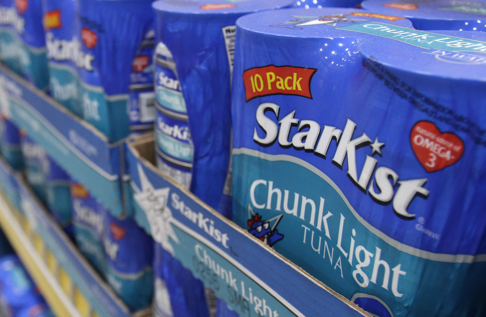 In this photo taken May 19, 2011, Starkist Tuna products sit on a shelf in a Little Rock, Ark., food warehouse . (AP Photo/Danny Johnston)