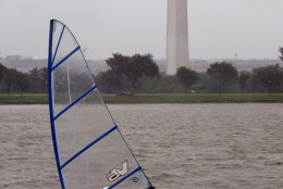 A wind surfer takes advantage of the wind as he passes the Washington Monument on the Potomac River in Washington, Thursday, Sept. 18, 2003, as the Washington area begins to feel the effects of Hurricane Isabel. (AP Photo/Evan Vucci)