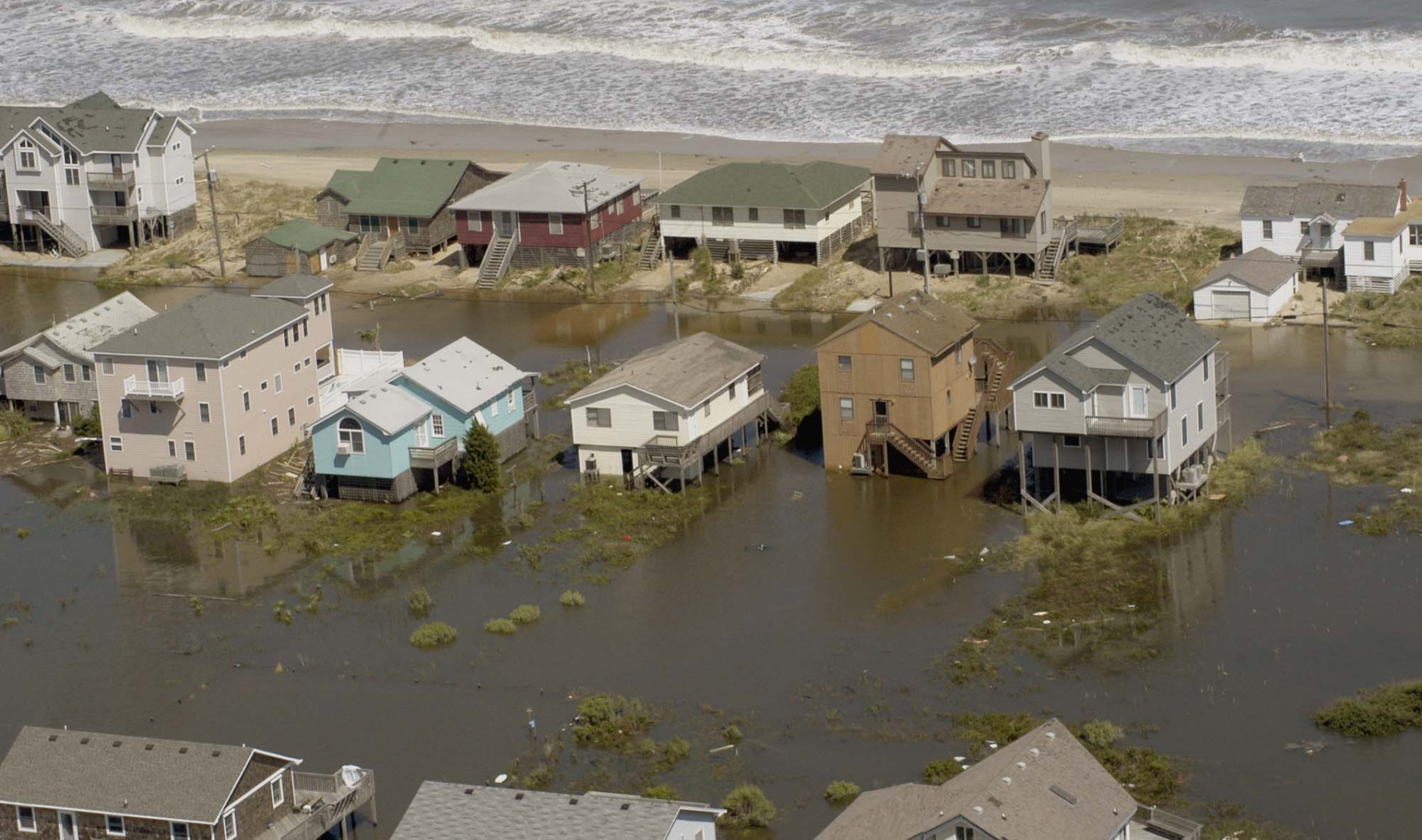 Standing water remains around these homes near Kill Devil Hills, N.C., Friday, Sept. 19, 2003, in this photo taken from the helicoptor which gave North Carolina Gov. Mike Easley a tour of the area hit by Hurricane Isabel. (AP Photo/Karen Tam)