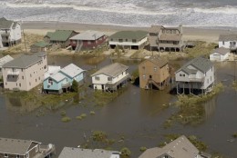 Standing water remains around these homes near Kill Devil Hills, N.C., Friday, Sept. 19, 2003, in this photo taken from the helicoptor which gave North Carolina Gov. Mike Easley a tour of the area hit by Hurricane Isabel. (AP Photo/Karen Tam)